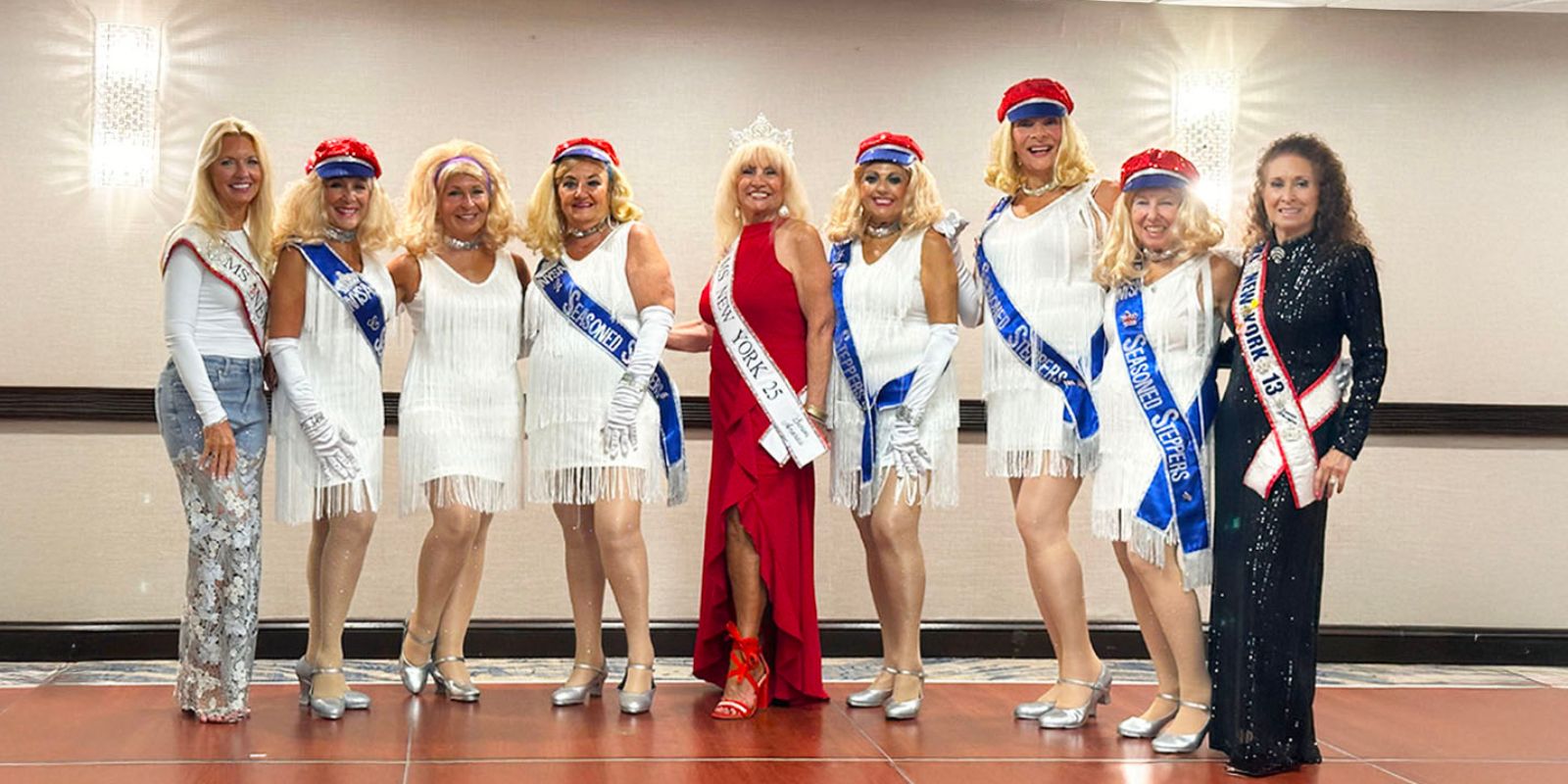 The Seasoned Steppers, former contestants of the Ms. New York Senior America contest, stand with several winners.
