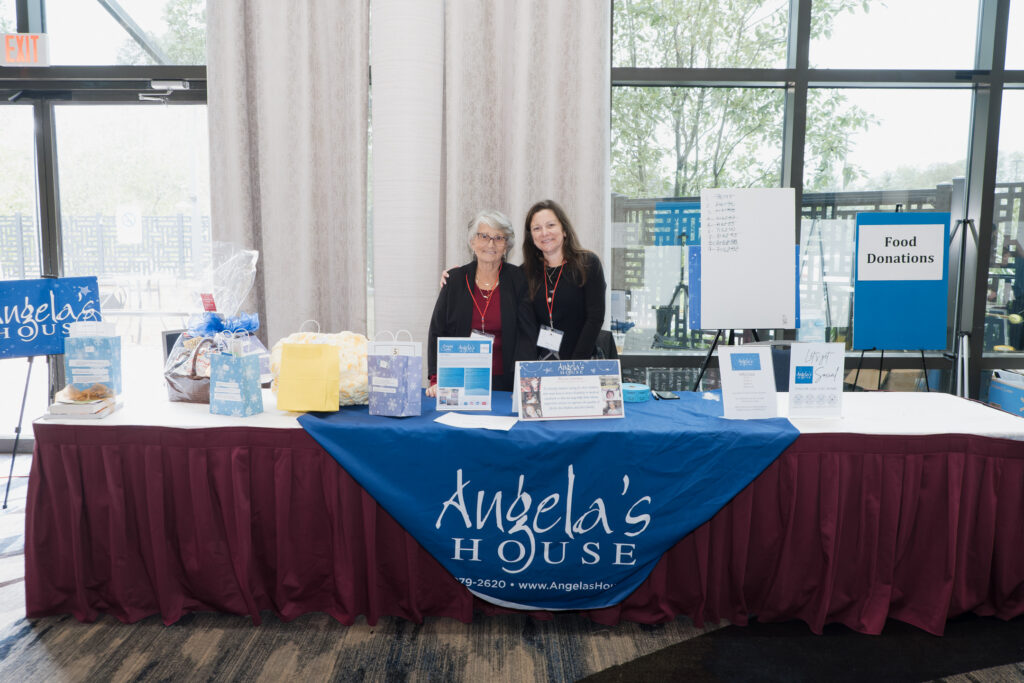 Angela's House volunteers at their booth