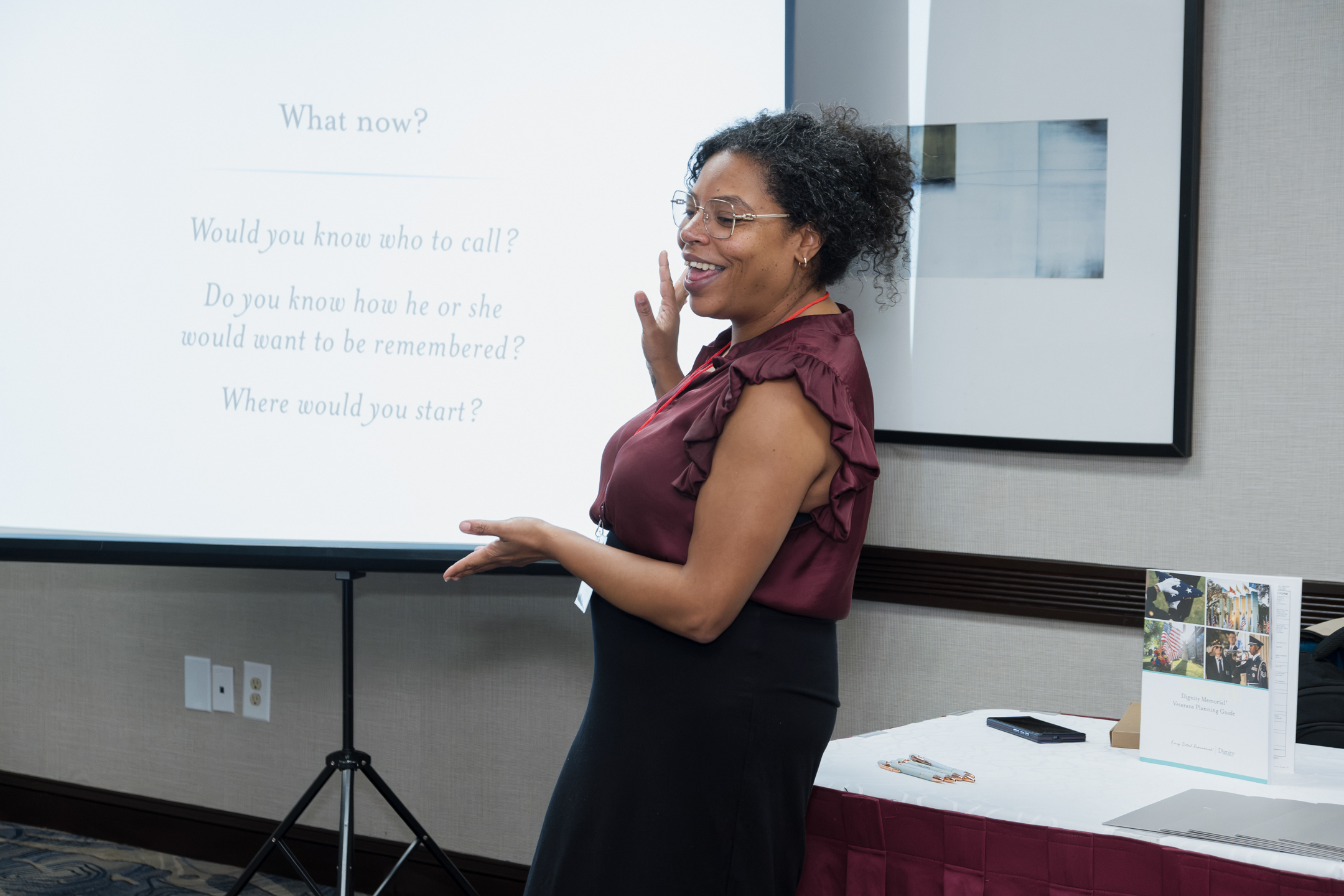 A speaker shares information on the screen